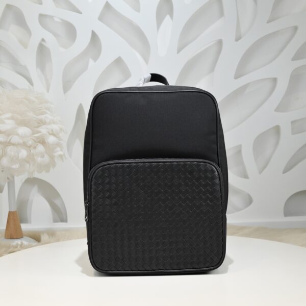 Bottega Veneta's classic Intrecciato woven men's backpack (fabric and leather combination).