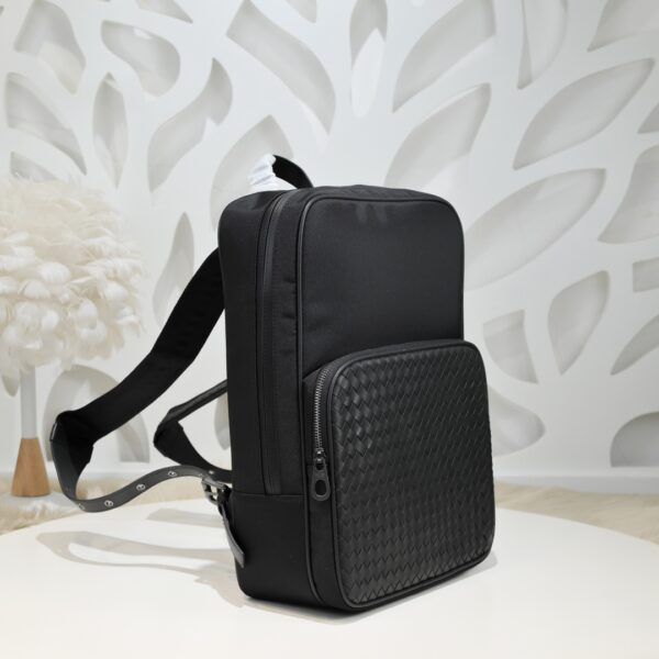 Bottega Veneta's classic Intrecciato woven men's backpack (fabric and leather combination).