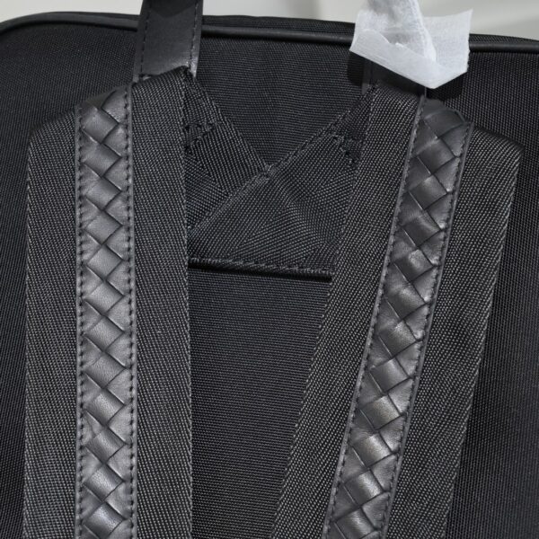 Bottega Veneta's classic Intrecciato woven men's backpack (fabric and leather combination).