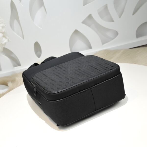 Bottega Veneta's classic Intrecciato woven men's backpack (fabric and leather combination).