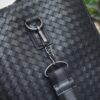 Bottega Veneta's classic Intrecciato woven men's travel bag (black calfskin).