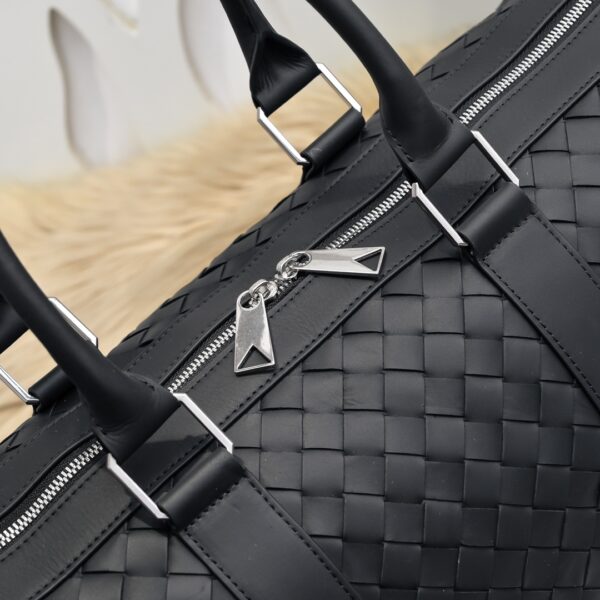 Bottega Veneta's classic Intrecciato woven men's travel bag set (black calfskin).