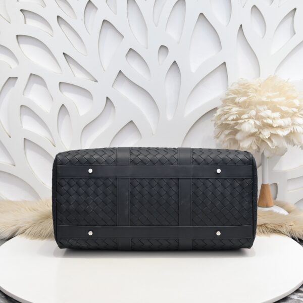 Bottega Veneta's classic Intrecciato woven men's travel bag set (black calfskin).