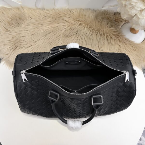 Bottega Veneta's classic Intrecciato woven men's travel bag set (black calfskin).