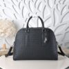 Bottega Veneta's classic Intrecciato woven men's travel bag (black calfskin).