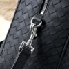 Bottega Veneta's classic Intrecciato woven men's travel bag (black calfskin).